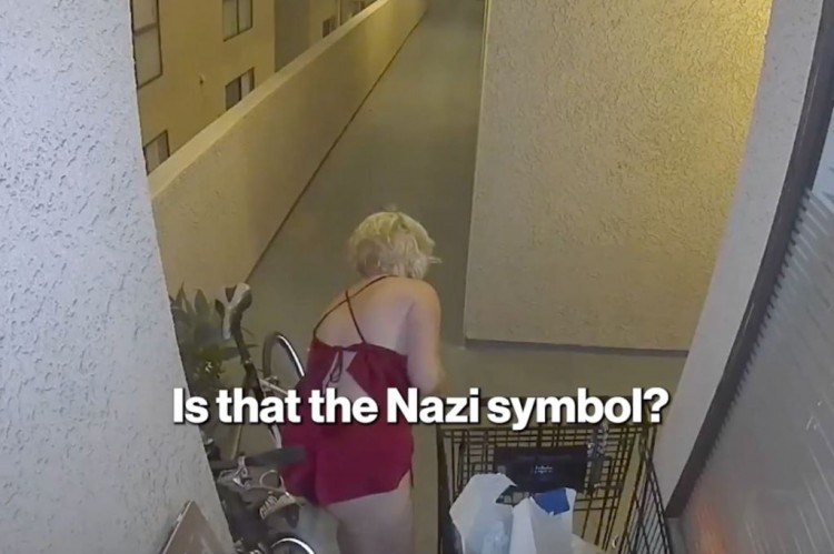 犹太妇女发现退休牧师在她的杂货上画纳粹标志后与他对峙